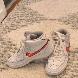 Nike White and Hot Pink Sneakers with High-Top Design and Ankle Support